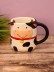 Кружка керамическая iLikeGift «Round cow», black 