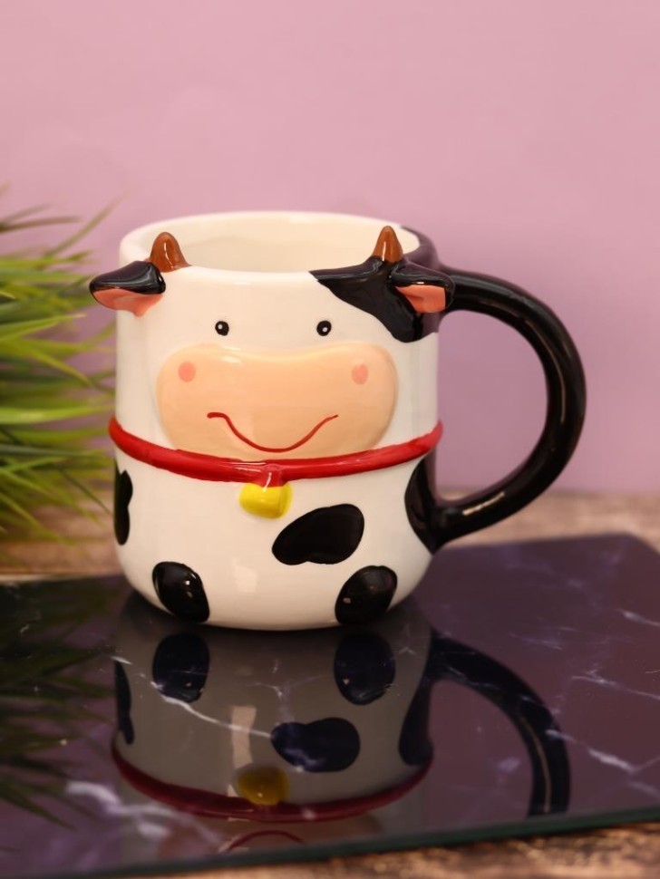 Кружка керамическая iLikeGift "Круглая корова", черная, 410мл