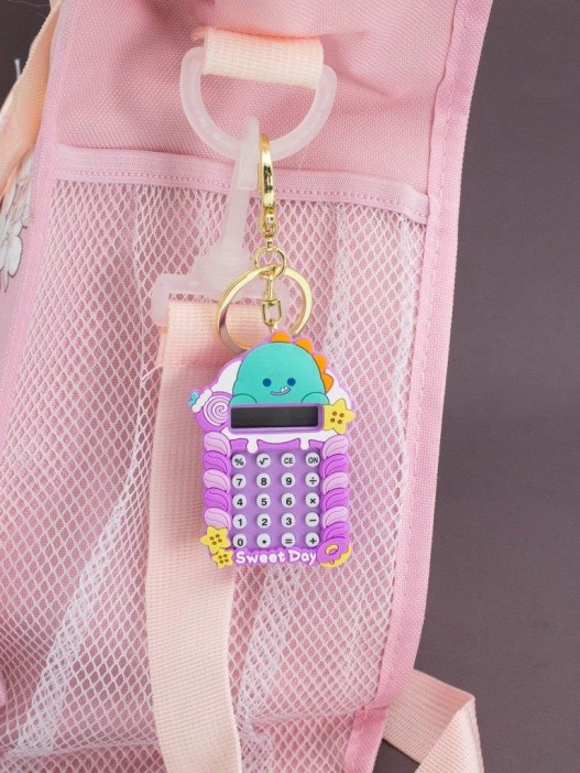 Брелок-калькулятор "Динозавр хулиган", фиолетовый 