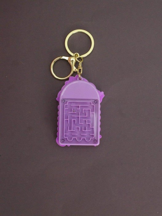 Брелок-калькулятор "Динозавр хулиган", фиолетовый 