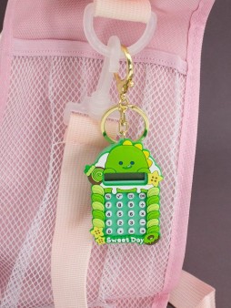 Брелок-калькулятор "Динозавр хулиган", зеленый